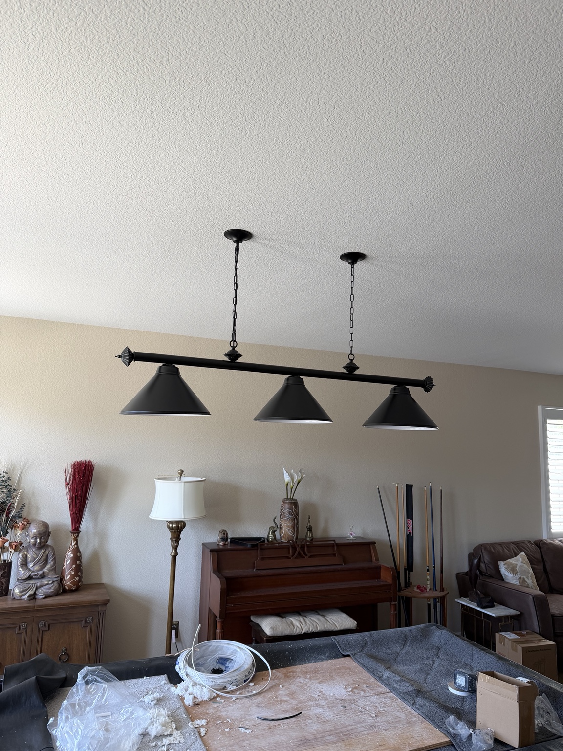 Linear pendant light installation by M's Electric